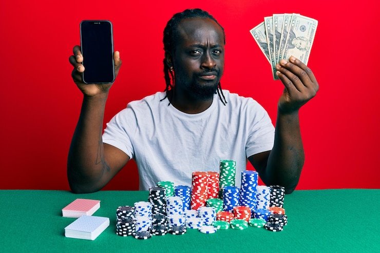 Kartu strategi dasar blackjack yang ditampilkan di sebelah meja Free Bet Blackjack boss toto